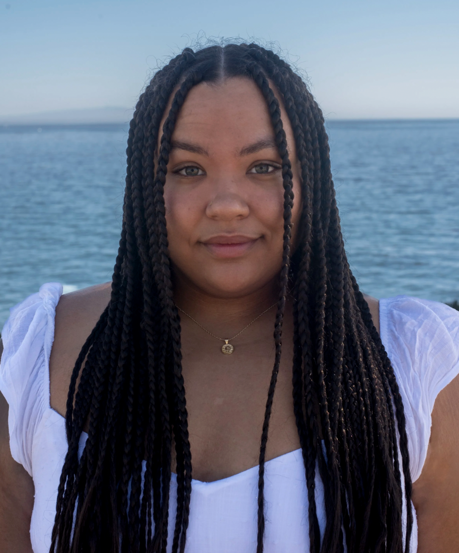 Leila Mottley, a young African-American woman with long braided hair